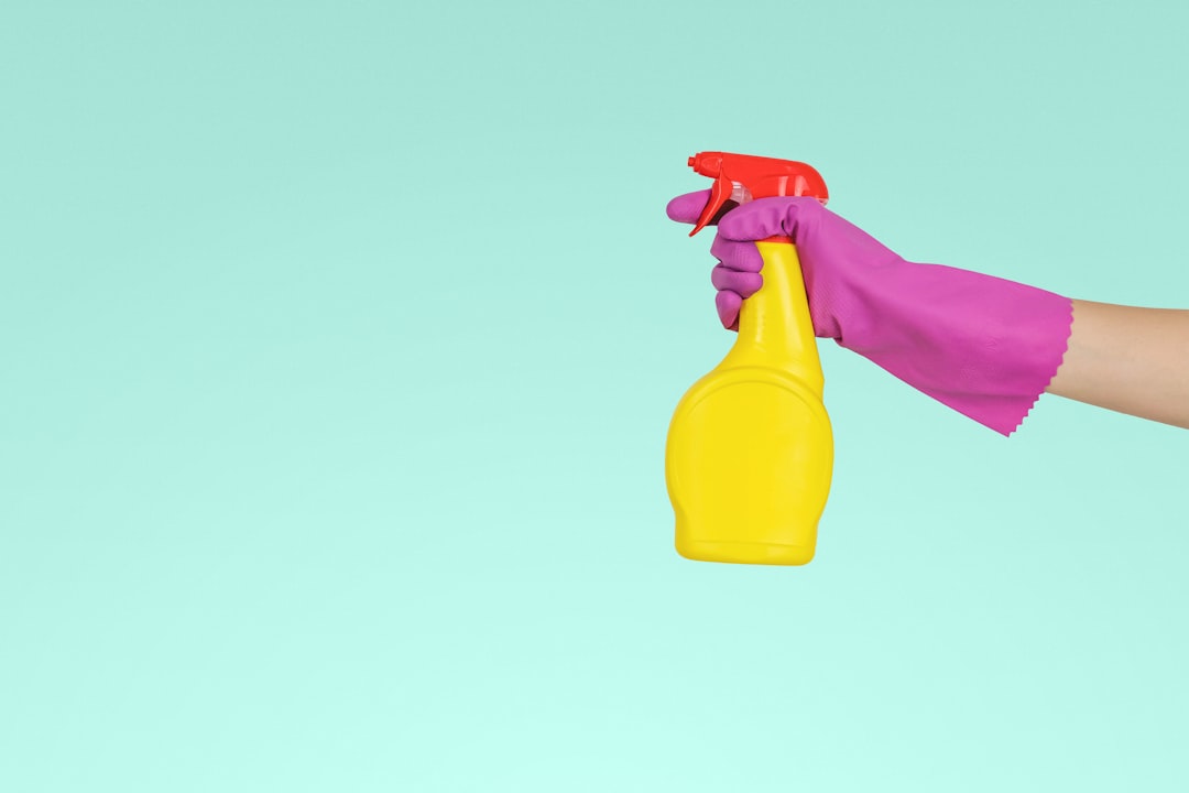 why-choose-us-02 person-holding-yellow-plastic-spray-bottle-zmnefoi3k
